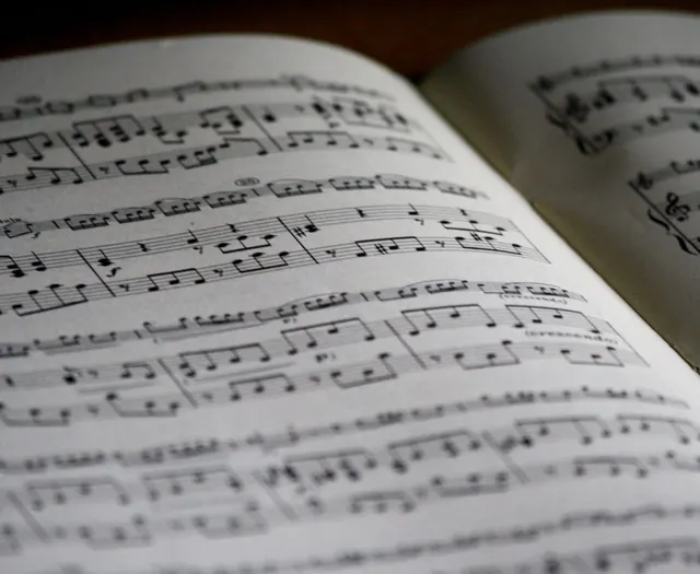 Open sheet music with soft focus across the page